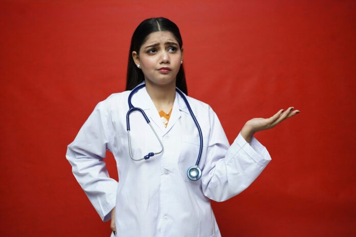 a doctor with a stethoscope around her neck
